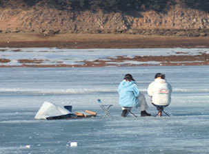 On the Icy Road or Frozen Lake|For saving the struggling drowning victims at the winter ice-fishing site.